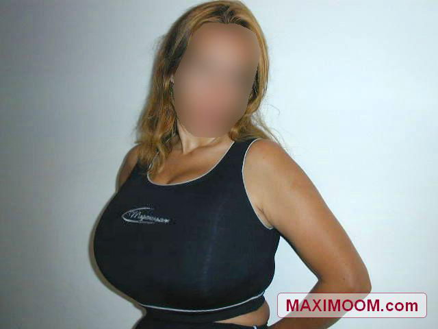 Maxi Moom Showing Her Black Top Full Of Soft Boob Meat